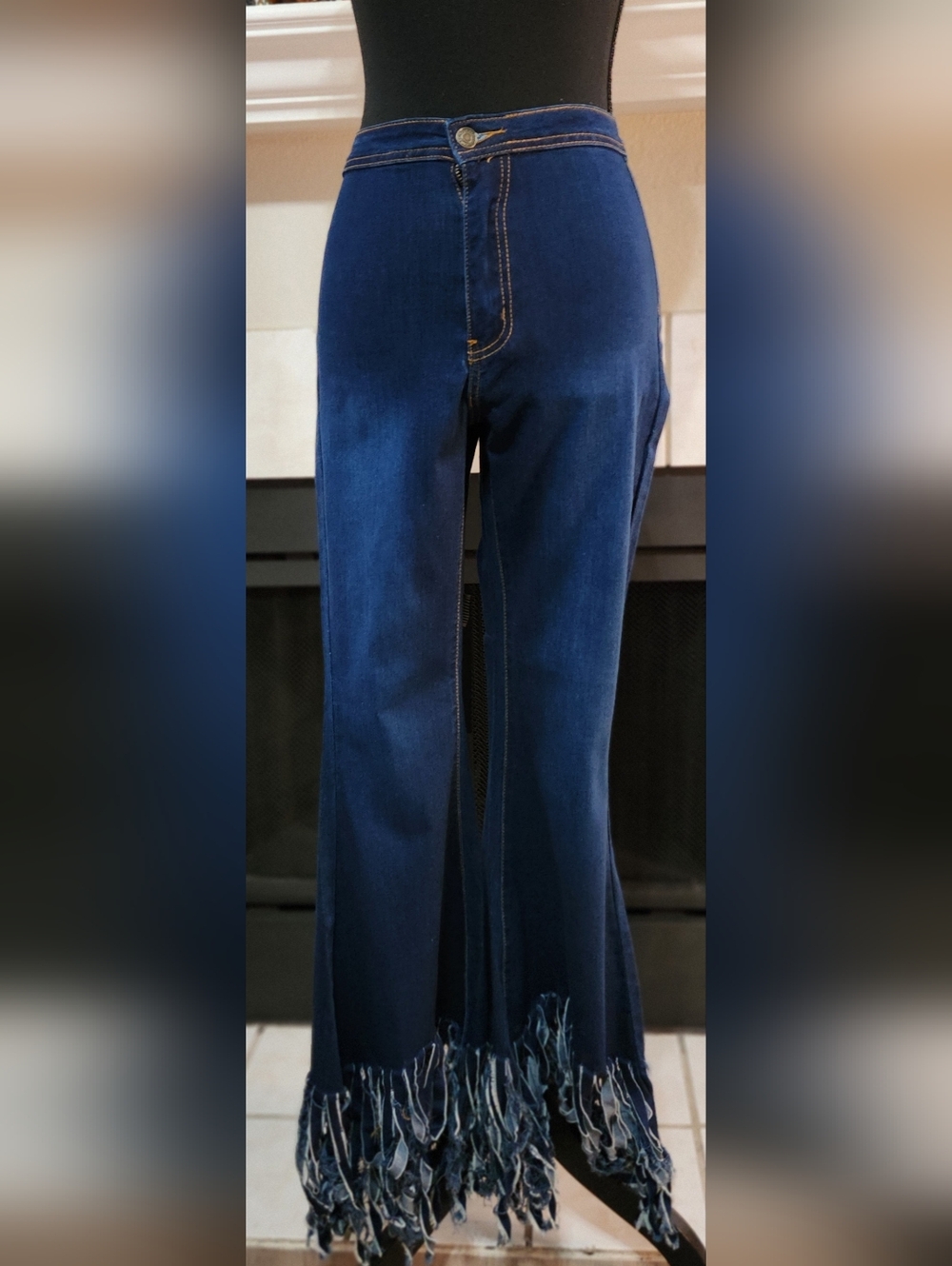 High-Rise Indigo Flare Jeans with Fringed Hem